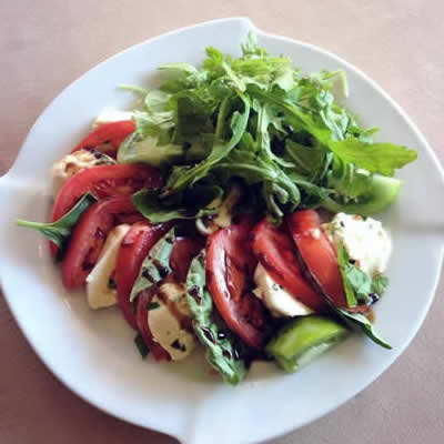 Photo: Heirloom tomato caprese salad